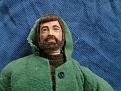 I purchased this Joe because of the good face and flocking.  He has stains on his neck, probably due to the die coming out of this old parka and the sweater underneath.